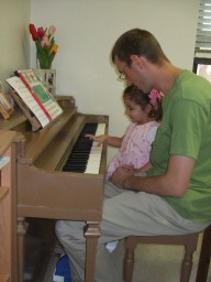 Derek and Karisa playing the piano